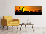 Leinwandbild Panorama Safarietiere bei Sonnenuntergang