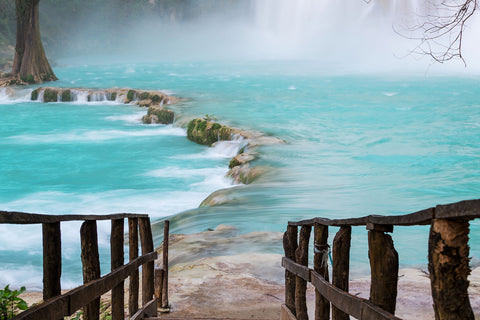 Fototapete Haus am Wasserfall