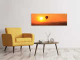 Leinwandbild Panorama Heissluftballon bei Sonnenuntergang