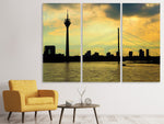 Leinwandbild 3-teilig Skyline im Abendlicht
